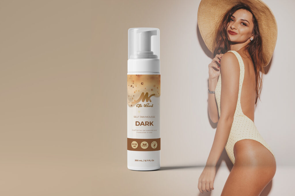 Glo Hard Dark self-tan mousse bottle photographed on a neutral background.